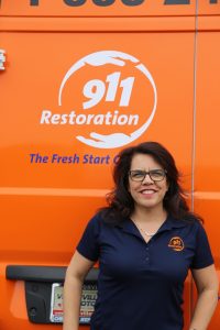 911-restoration-water-damage-mold-remediation-fire-damage-person-van-director